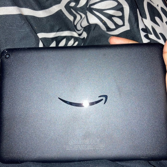 Black Fire tablet , charger and case included . - Picture 2 of 3